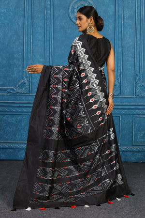 Shop black and white pochampally silk ikkat sari online in USA. Look your best on festive occasions in latest designer sarees, pure silk sarees, Kanchipuram sarees, handwoven sarees, tussar silk sarees, embroidered sarees from Pure Elegance Indian clothing store in USA.-back