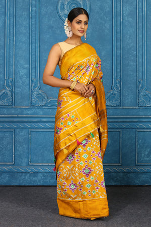 Shop stunning mustard pochampally ikkat sari online in USA. Look your best on festive occasions in latest designer sarees, pure silk sarees, Kanchipuram sarees, handwoven sarees, tussar silk sarees, embroidered sarees from Pure Elegance Indian clothing store in USA.-side