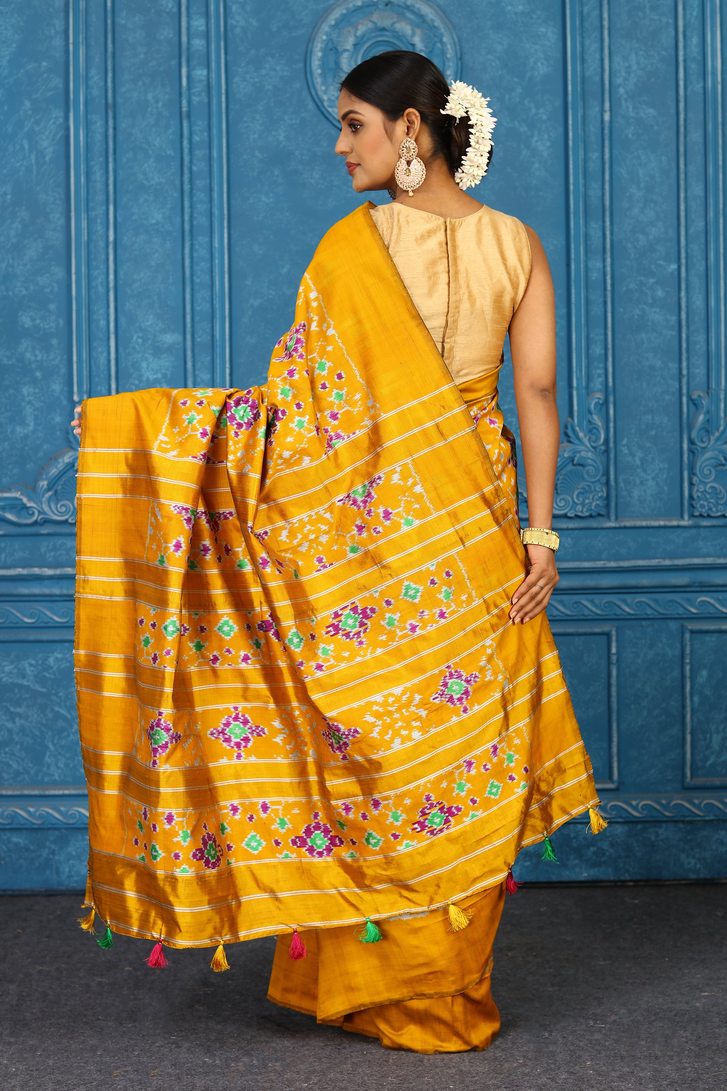 Shop stunning mustard pochampally ikkat sari online in USA. Look your best on festive occasions in latest designer sarees, pure silk sarees, Kanchipuram sarees, handwoven sarees, tussar silk sarees, embroidered sarees from Pure Elegance Indian clothing store in USA.-back