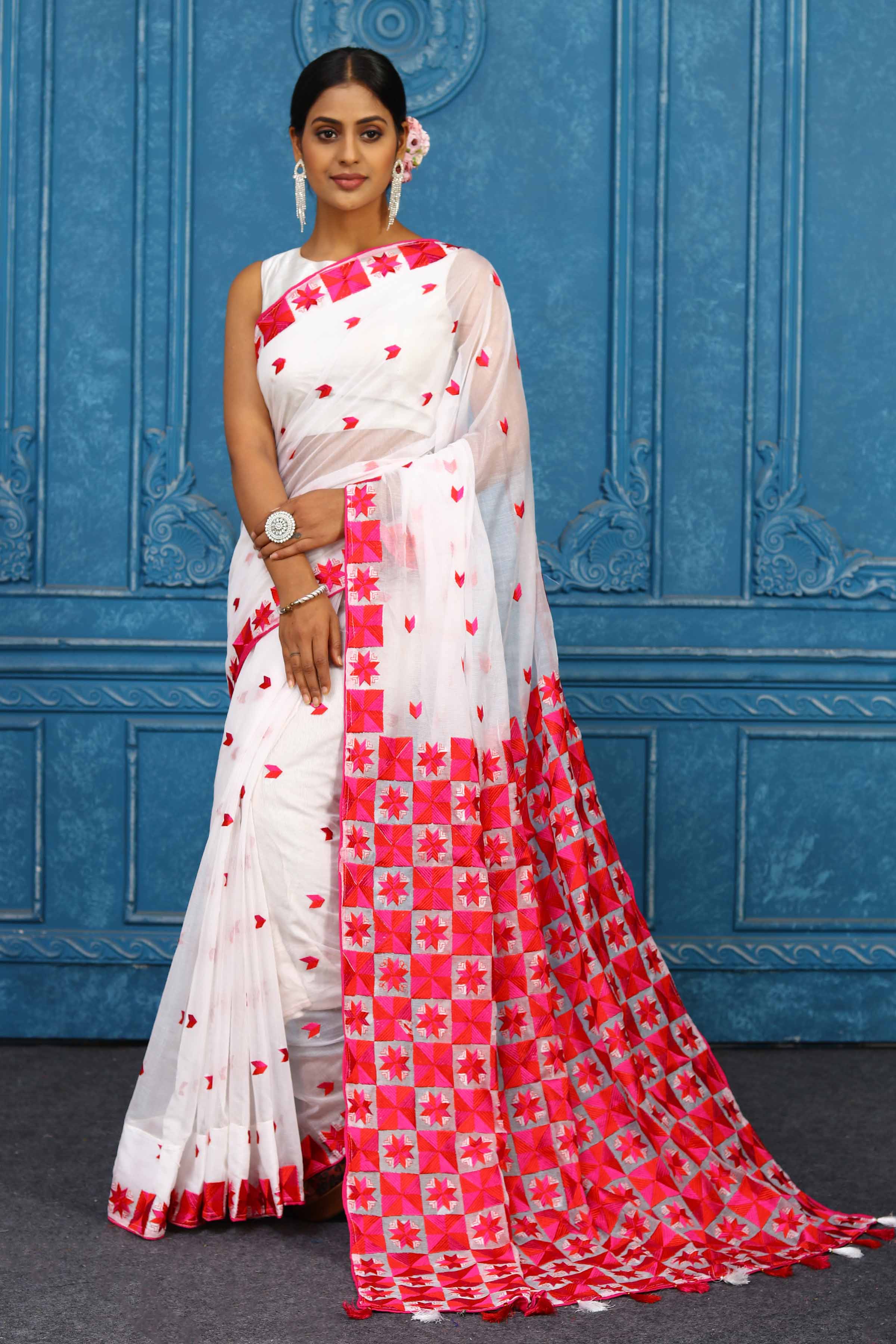 Shop beautiful white and red phulkari embroidery sari online in USA. Look your best on festive occasions in latest designer sarees, pure silk sarees, Kanchipuram sarees, handwoven sarees, tussar silk sarees, embroidered sarees from Pure Elegance Indian clothing store in USA.-full view