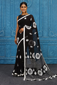 Shop black and white phulkari embroidery sari online in USA. Look your best on festive occasions in latest designer sarees, pure silk sarees, Kanchipuram sarees, handwoven sarees, tussar silk sarees, embroidered sarees from Pure Elegance Indian clothing store in USA.-full view