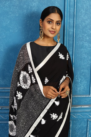 Shop black and white phulkari embroidery sari online in USA. Look your best on festive occasions in latest designer sarees, pure silk sarees, Kanchipuram sarees, handwoven sarees, tussar silk sarees, embroidered sarees from Pure Elegance Indian clothing store in USA.-closeup
