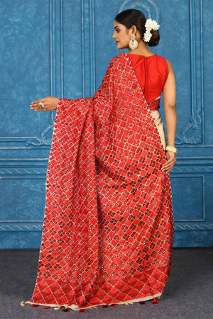 Shop cream red phulkari embroidery sari online in USA. Look your best on festive occasions in latest designer sarees, pure silk sarees, Kanchipuram sarees, handwoven sarees, tussar silk sarees, embroidered sarees from Pure Elegance Indian clothing store in USA.-back
