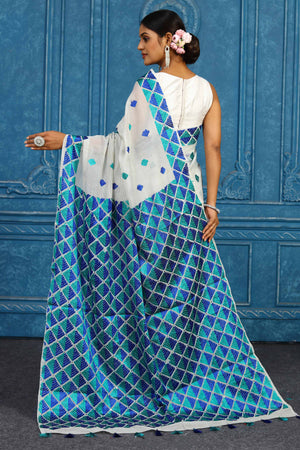 Buy elegant white phulkari embroidery sari online in USA. Look your best on festive occasions in latest designer sarees, pure silk sarees, Kanchipuram sarees, handwoven sarees, tussar silk sarees, embroidered sarees from Pure Elegance Indian clothing store in USA.-back