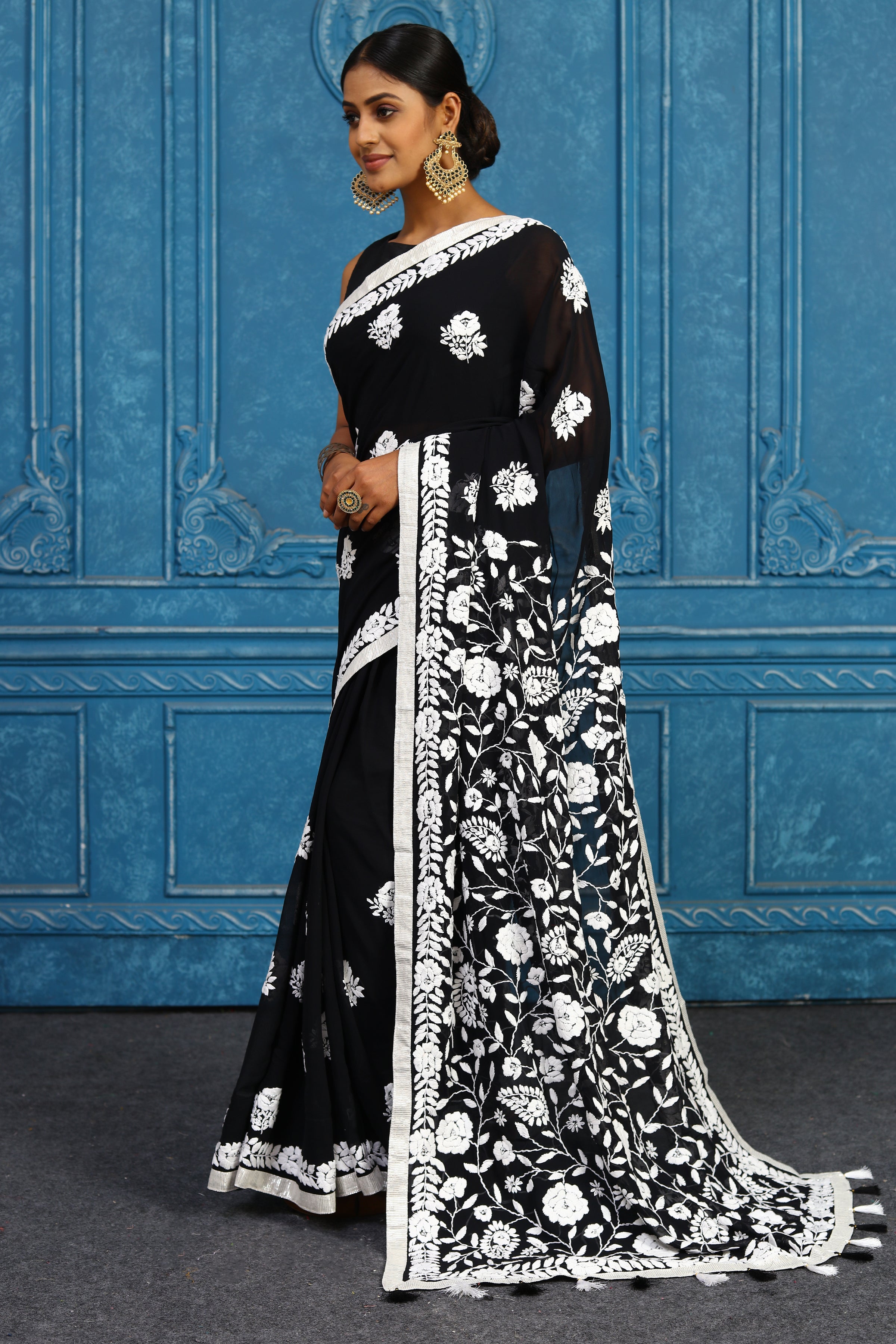 Shop stunning black phulkari embroidery saree online in USA. Look your best on festive occasions in latest designer sarees, pure silk sarees, Kanchipuram sarees, handwoven sarees, tussar silk sarees, embroidered sarees from Pure Elegance Indian clothing store in USA.-side