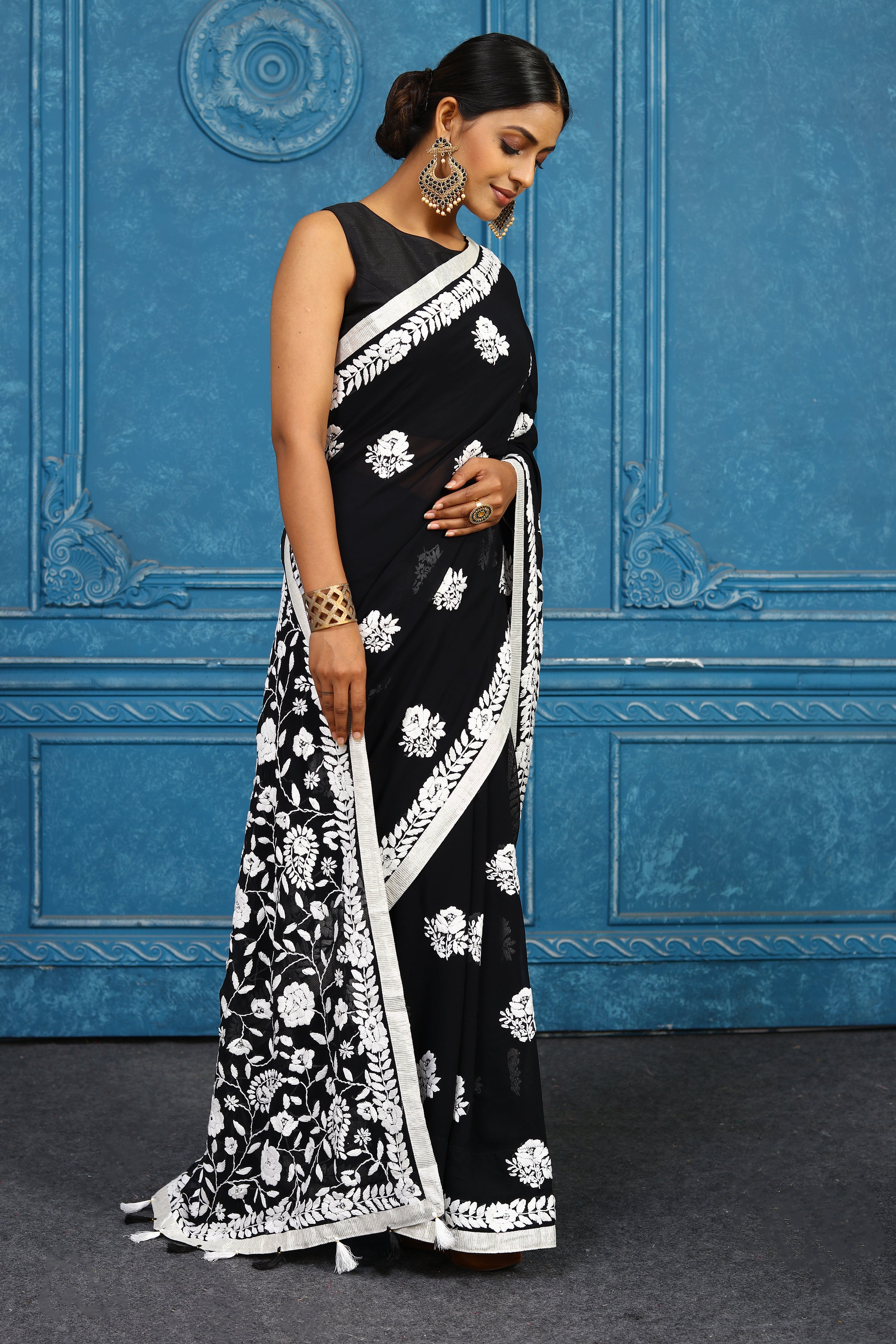 Shop stunning black phulkari embroidery saree online in USA. Look your best on festive occasions in latest designer sarees, pure silk sarees, Kanchipuram sarees, handwoven sarees, tussar silk sarees, embroidered sarees from Pure Elegance Indian clothing store in USA.-saree