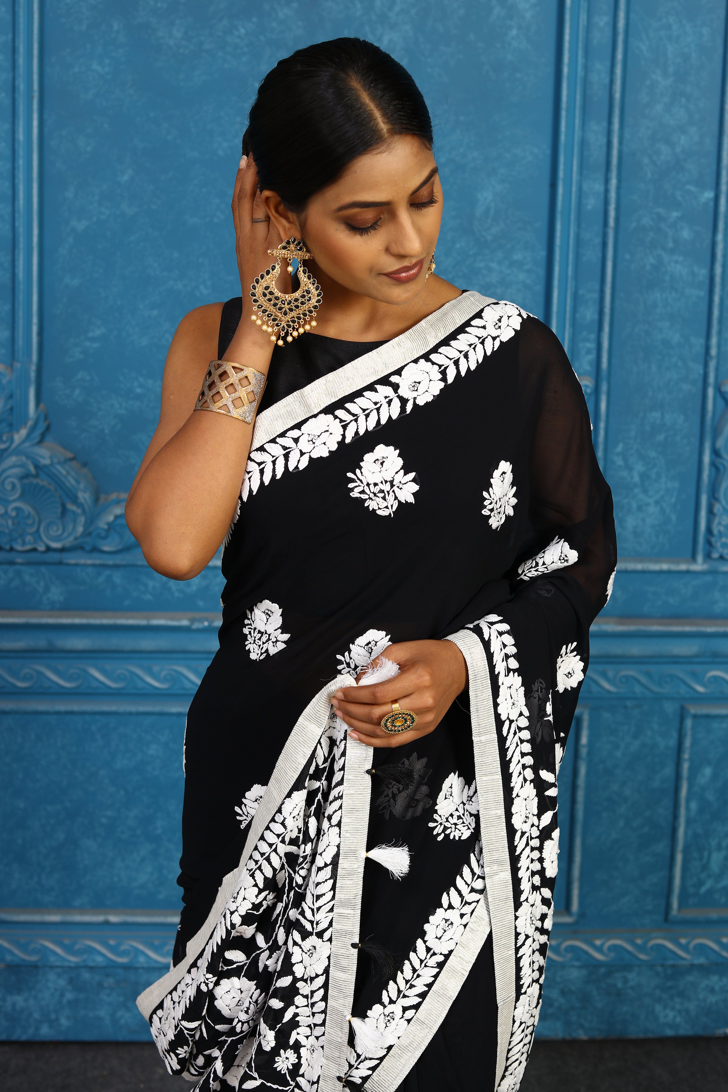Shop stunning black phulkari embroidery saree online in USA. Look your best on festive occasions in latest designer sarees, pure silk sarees, Kanchipuram sarees, handwoven sarees, tussar silk sarees, embroidered sarees from Pure Elegance Indian clothing store in USA.-closeup