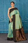 Shop stunning pista green Kanchipuram silk saree online in USA with black border. Radiate glam at parties in dazzling designer sarees, party sarees, embroidered sarees, sequin work sarees, Bollywood sarees, handloom sarees from Pure Elegance Indian saree store in USA.-full view