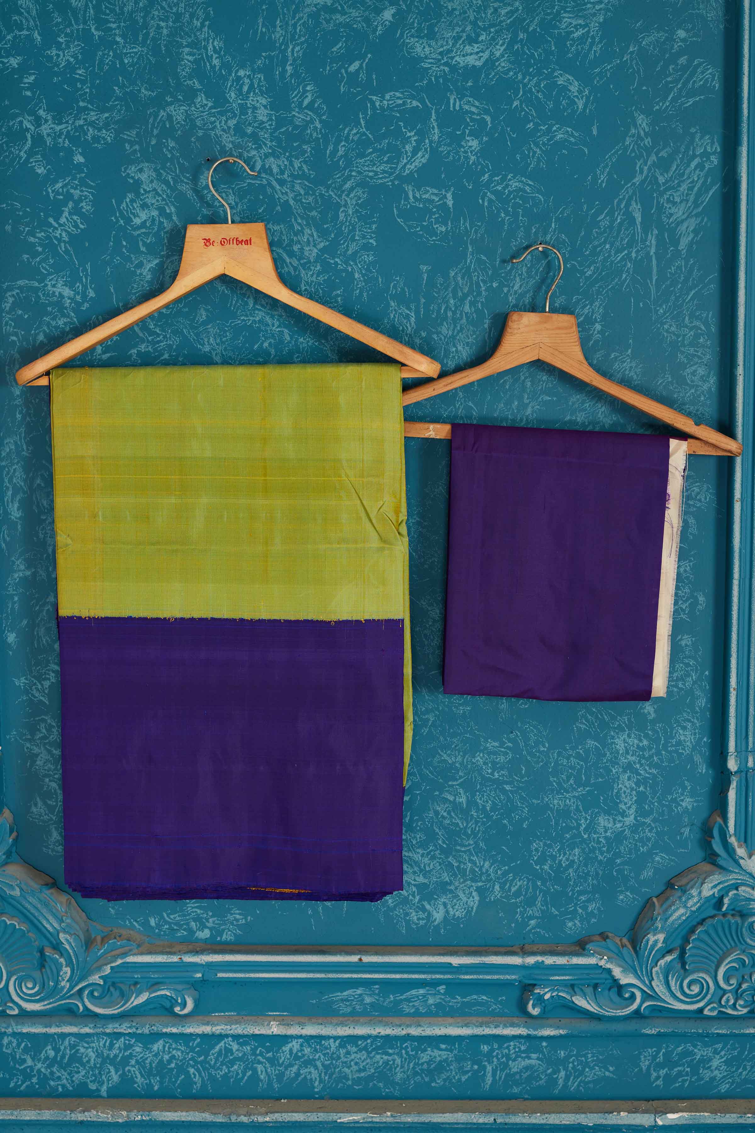 Shop beautiful pista green Kanchipuram silk sari online in USA with blue border. Radiate glam at parties in dazzling designer sarees, party sarees, embroidered sarees, sequin work sarees, Bollywood sarees, handloom sarees from Pure Elegance Indian saree store in USA.-blouse
