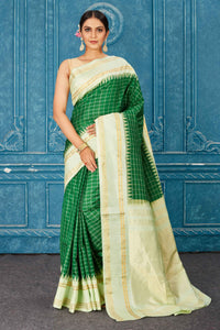 Buy stunning green Kanchipuram silk saree online in USA with mint green border. Radiate glam at parties in dazzling designer sarees, party sarees, embroidered sarees, sequin work sarees, Bollywood sarees, handloom sarees from Pure Elegance Indian saree store in USA.-full view