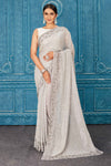 Shop beautiful light grey sequin saree online in USA with stone work. Radiate glam at parties in dazzling designer sarees, party sarees, embroidered sarees, sequin work sarees, Bollywood sarees, handloom sarees from Pure Elegance Indian saree store in USA.-full view