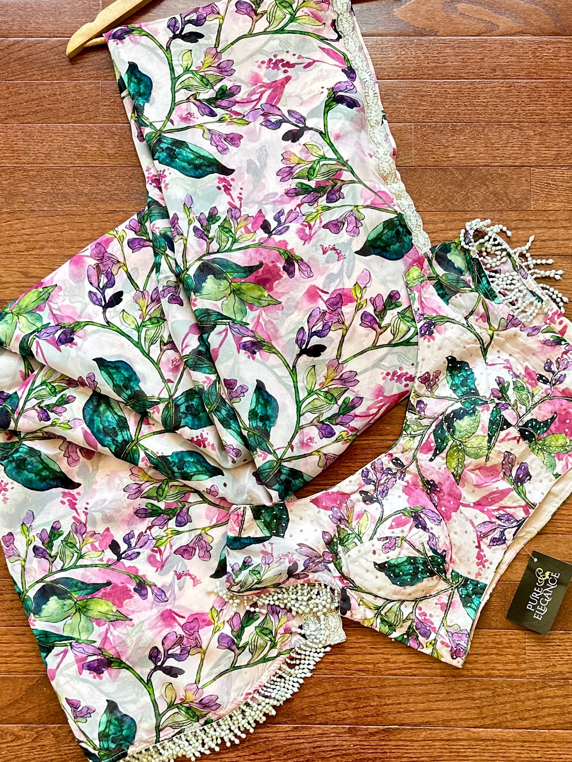 Buy stunning multicolor floral print georgette sari online in USA with designer blouse. Look your best on festive occasions in latest designer sarees, pure silk sarees, Kanjivaram silk saris, handwoven saris, tussar silk sarees, embroidered saris from Pure Elegance Indian clothing store in USA.-full view