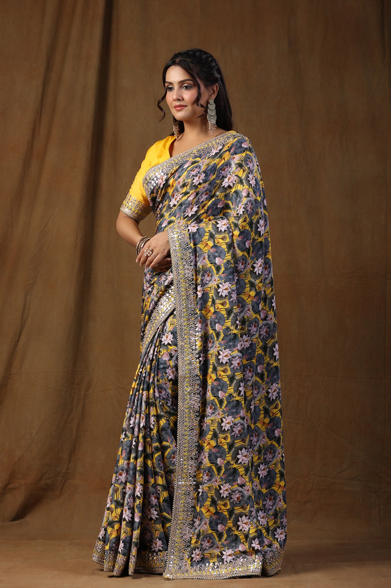 Buy yellow and grey floral print crepe sari online in USA with embroidered border. Make a fashion statement on festive occasions and weddings with designer suits, Indian dresses, Anarkali suits, palazzo suits, designer sarees, sharara suits, Bollywood saris from Pure Elegance Indian fashion store in USA.-side