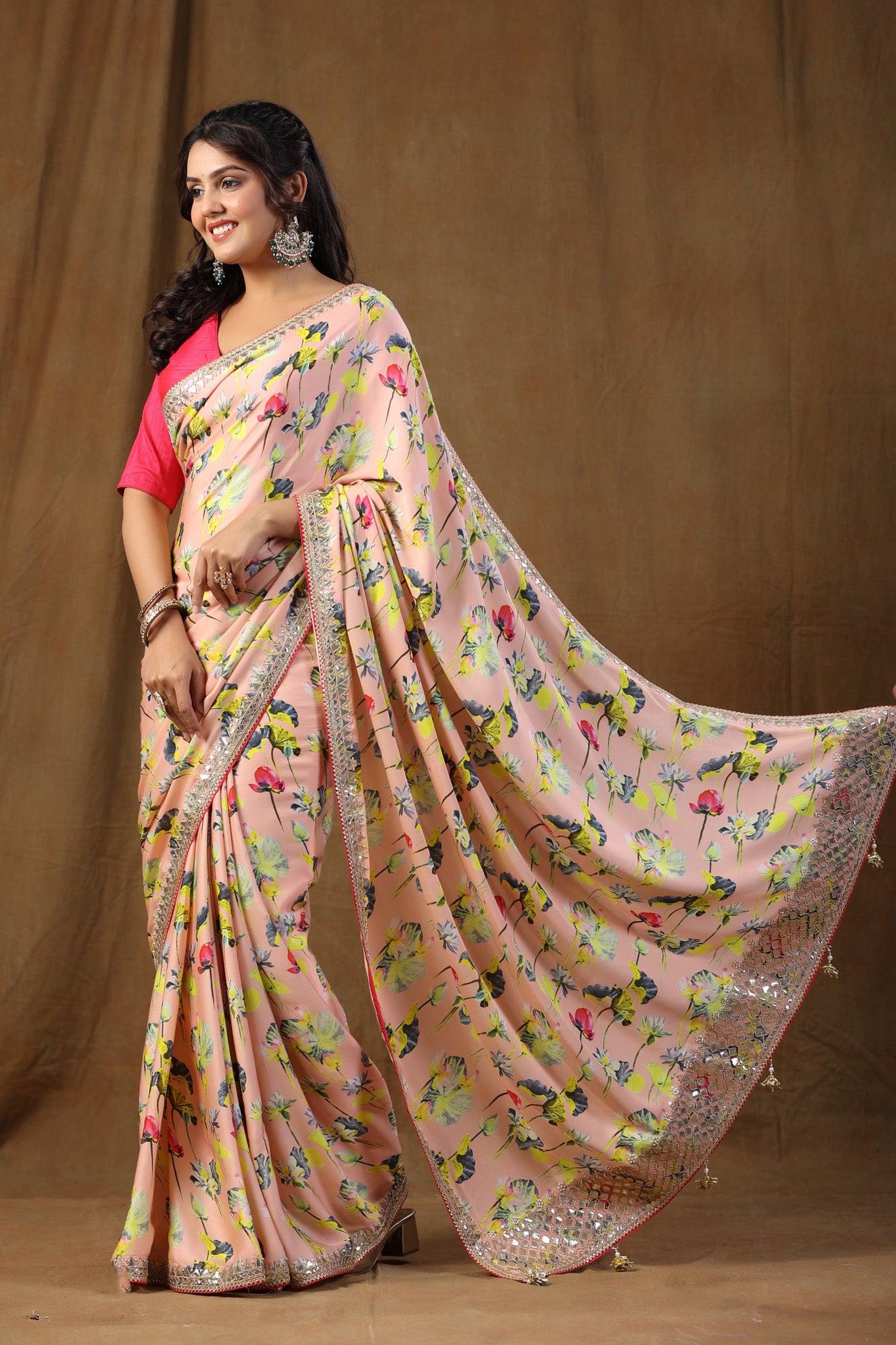 Buy stunning peach floral print crepe sari online in USA with embroidered border. Make a fashion statement on festive occasions and weddings with designer suits, Indian dresses, Anarkali suits, palazzo suits, designer sarees, sharara suits, Bollywood saris from Pure Elegance Indian fashion store in USA.-saree