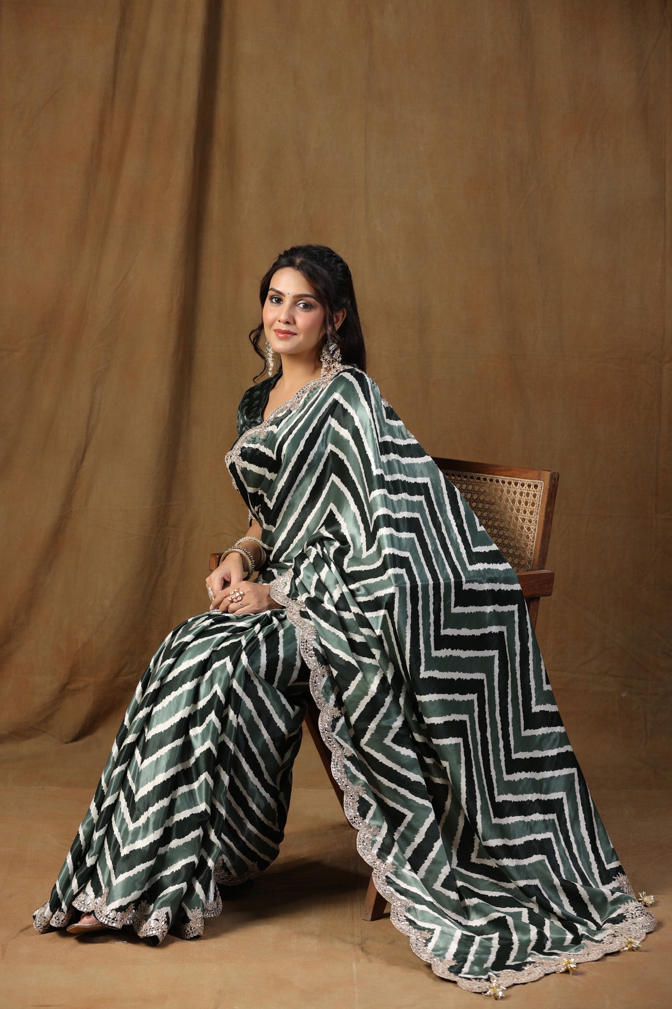 Buy grey and black embroidered tussar silk sari online in USA with blouse. Make a fashion statement on festive occasions and weddings with designer suits, Indian dresses, Anarkali suits, palazzo suits, designer sarees, sharara suits, Bollywood saris from Pure Elegance Indian fashion store in USA.-saree