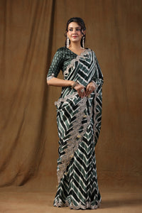 Buy grey and black embroidered tussar silk sari online in USA with blouse. Make a fashion statement on festive occasions and weddings with designer suits, Indian dresses, Anarkali suits, palazzo suits, designer sarees, sharara suits, Bollywood saris from Pure Elegance Indian fashion store in USA.-full view