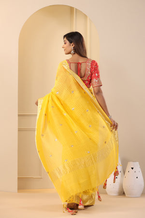 Shop yellow silk organza sari online in USA with red embroidered blouse. Make a fashion statement on festive occasions and weddings with designer suits, Indian dresses, Anarkali suits, palazzo suits, designer sarees, sharara suits, Bollywood saris from Pure Elegance Indian fashion store in USA.-back