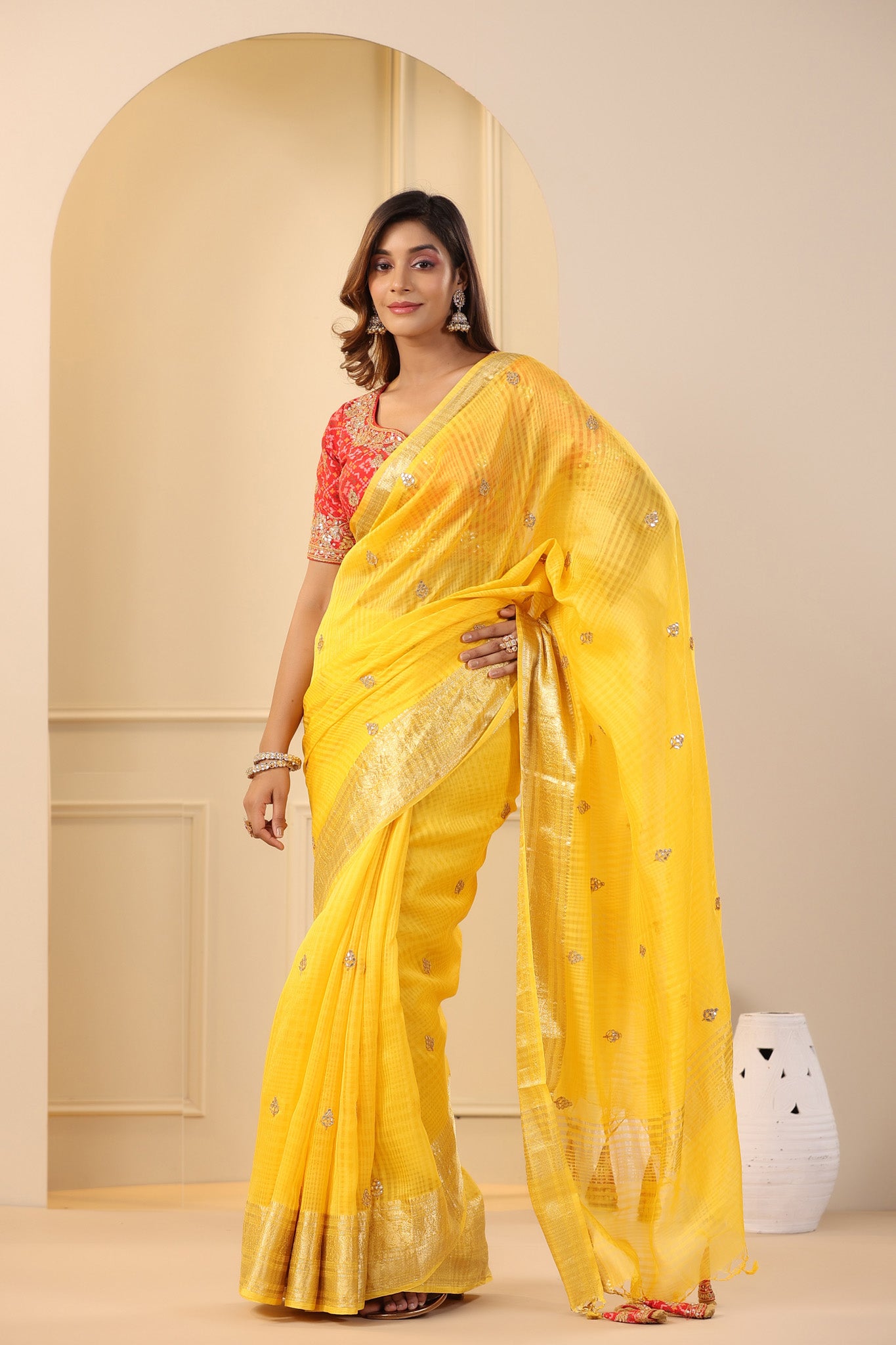 Shop yellow silk organza sari online in USA with red embroidered blouse. Make a fashion statement on festive occasions and weddings with designer suits, Indian dresses, Anarkali suits, palazzo suits, designer sarees, sharara suits, Bollywood saris from Pure Elegance Indian fashion store in USA.-saree