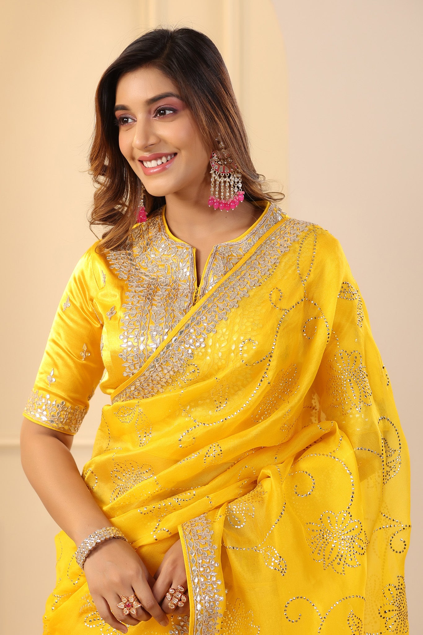Buy beautiful mango yellow embroidered organza sari online in USA with embroidered blouse. Make a fashion statement on festive occasions and weddings with designer suits, Indian dresses, Anarkali suits, palazzo suits, designer sarees, sharara suits, Bollywood saris from Pure Elegance Indian fashion store in USA.-closeup
