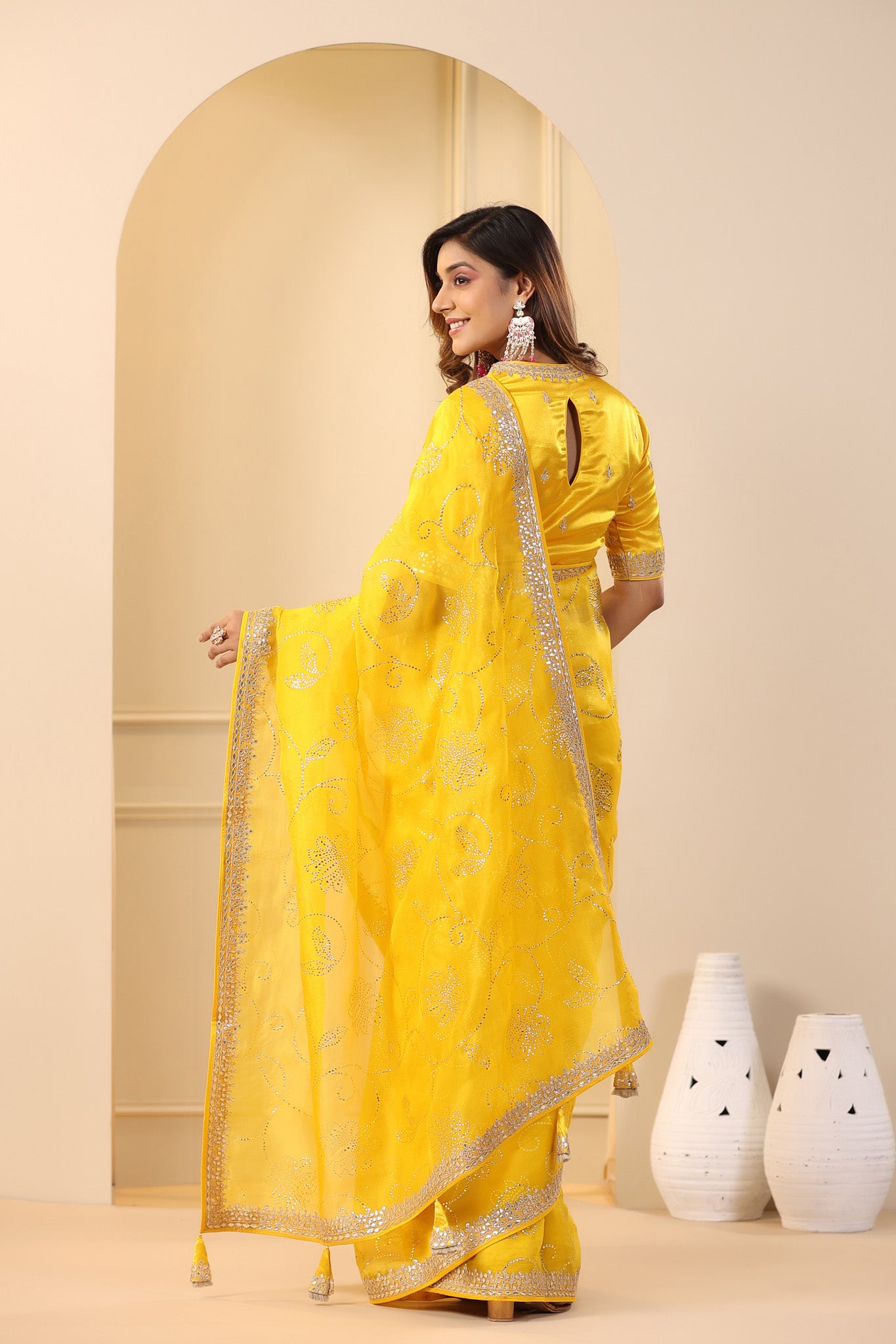 Buy beautiful mango yellow embroidered organza sari online in USA with embroidered blouse. Make a fashion statement on festive occasions and weddings with designer suits, Indian dresses, Anarkali suits, palazzo suits, designer sarees, sharara suits, Bollywood saris from Pure Elegance Indian fashion store in USA.-back