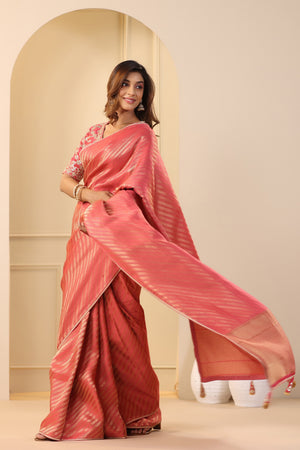 Buy beautiful pink silk sari online in USA with embroidered sari blouse. Make a fashion statement on festive occasions and weddings with designer suits, Indian dresses, Anarkali suits, palazzo suits, designer sarees, sharara suits, Bollywood saris from Pure Elegance Indian fashion store in USA.-pallu