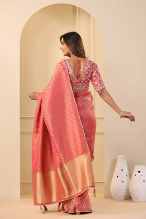 Buy beautiful pink silk sari online in USA with embroidered sari blouse. Make a fashion statement on festive occasions and weddings with designer suits, Indian dresses, Anarkali suits, palazzo suits, designer sarees, sharara suits, Bollywood saris from Pure Elegance Indian fashion store in USA.-back
