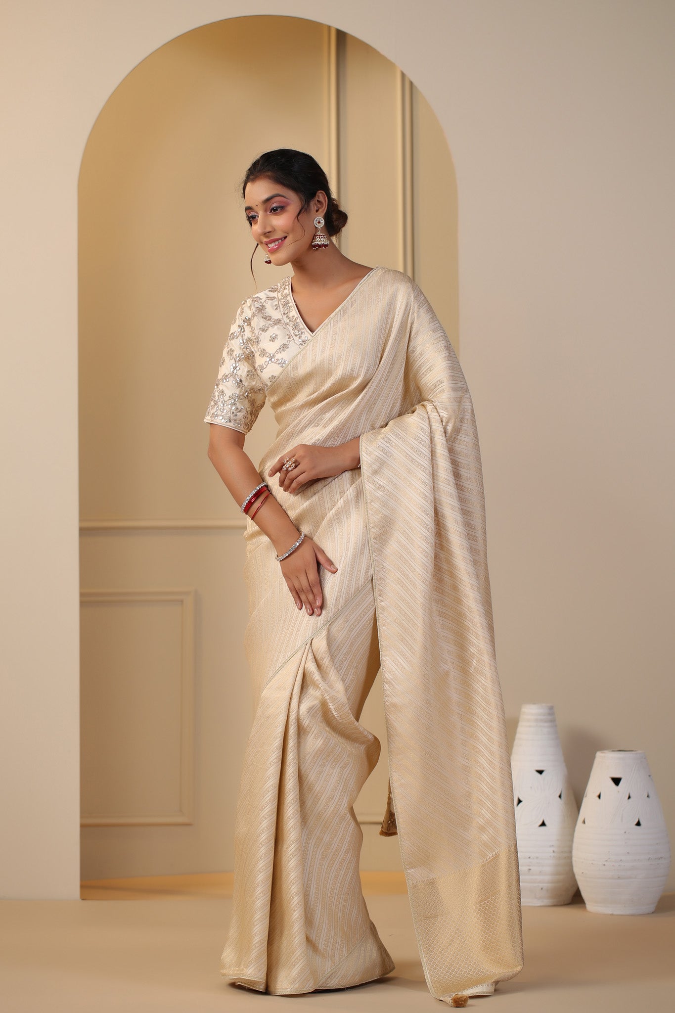 Shop cream silk sari online in USA with embroidered saree blouse. Make a fashion statement on festive occasions and weddings with designer suits, Indian dresses, Anarkali suits, palazzo suits, designer sarees, sharara suits, Bollywood saris from Pure Elegance Indian fashion store in USA.-pallu