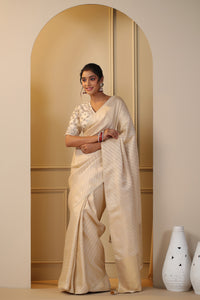 Shop cream silk sari online in USA with embroidered saree blouse. Make a fashion statement on festive occasions and weddings with designer suits, Indian dresses, Anarkali suits, palazzo suits, designer sarees, sharara suits, Bollywood saris from Pure Elegance Indian fashion store in USA.-full view