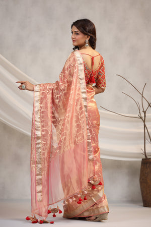 Shop light pink silk organza sari online in USA with red saree blouse. Make a fashion statement on festive occasions and weddings with designer suits, Indian dresses, Anarkali suits, palazzo suits, designer sarees, sharara suits, Bollywood saris from Pure Elegance Indian fashion store in USA.-back