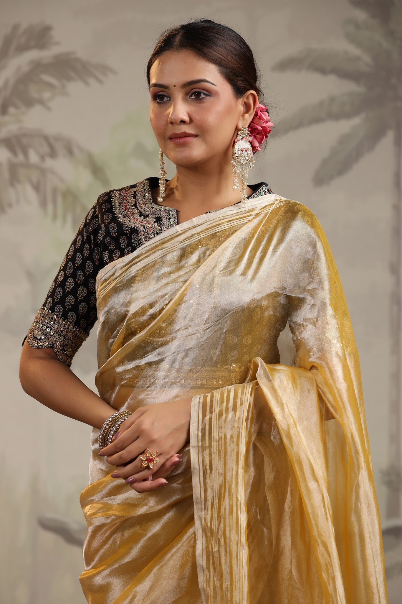 Shop yellow tissue silk sari online in USA with embroidered blouse. Make a fashion statement on festive occasions and weddings with designer suits, Indian dresses, Anarkali suits, palazzo suits, designer sarees, sharara suits, Bollywood saris from Pure Elegance Indian fashion store in USA.-closeup