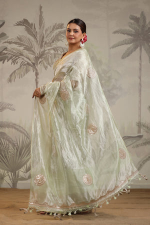 Shop pista green tissue silk sari online in USA with embroidered blouse. Make a fashion statement on festive occasions and weddings with designer suits, Indian dresses, Anarkali suits, palazzo suits, designer sarees, sharara suits, Bollywood saris from Pure Elegance Indian fashion store in USA.-pallu