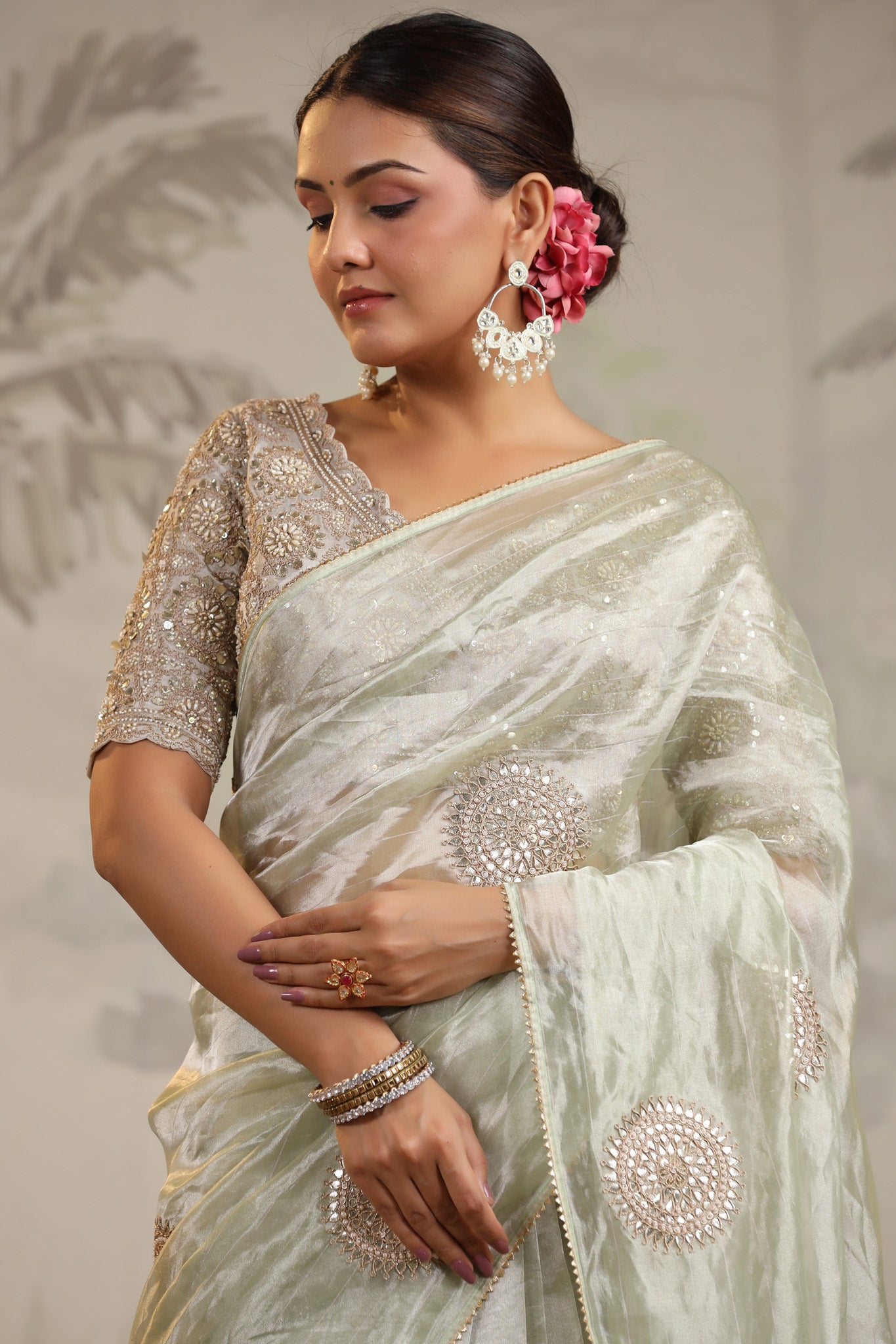 Shop pista green tissue silk sari online in USA with embroidered blouse. Make a fashion statement on festive occasions and weddings with designer suits, Indian dresses, Anarkali suits, palazzo suits, designer sarees, sharara suits, Bollywood saris from Pure Elegance Indian fashion store in USA.-closeup