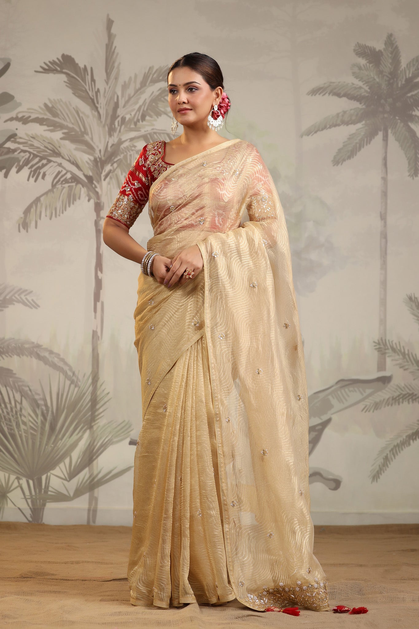 Shop golden tissue silk sari online in USA with red embroidered blouse. Make a fashion statement on festive occasions and weddings with designer suits, Indian dresses, Anarkali suits, palazzo suits, designer sarees, sharara suits, Bollywood saris from Pure Elegance Indian fashion store in USA.-front