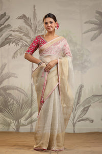 Buy beautiful cream tissue organza sari online in USA with pink embroidered designer blouse. Make a fashion statement on festive occasions and weddings with designer suits, Indian dresses, Anarkali suits, palazzo suits, designer sarees, sharara suits, Bollywood saris from Pure Elegance Indian fashion store in USA.-full view