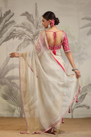 Buy beautiful cream tissue organza sari online in USA with pink embroidered designer blouse. Make a fashion statement on festive occasions and weddings with designer suits, Indian dresses, Anarkali suits, palazzo suits, designer sarees, sharara suits, Bollywood saris from Pure Elegance Indian fashion store in USA.-back