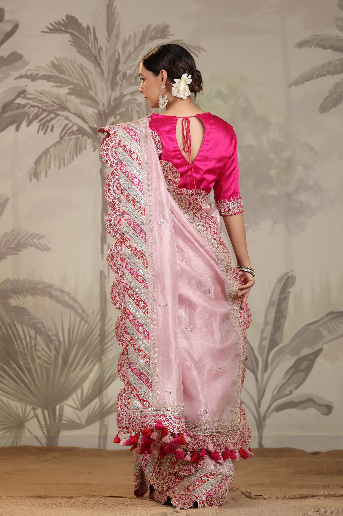 Shop light pink heavy embroidery silk sari online in USA with pink designer blouse. Make a fashion statement on festive occasions and weddings with designer suits, Indian dresses, Anarkali suits, palazzo suits, designer sarees, sharara suits, Bollywood saris from Pure Elegance Indian fashion store in USA.-back