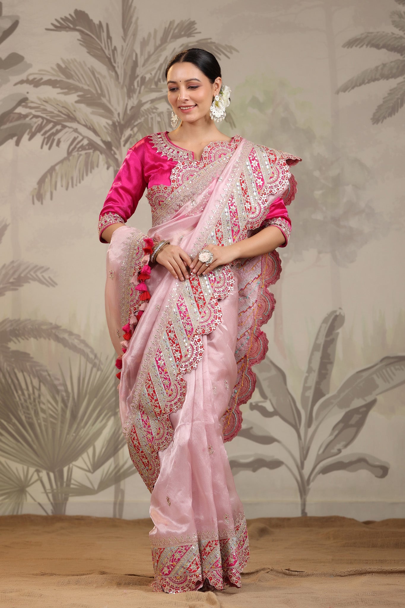 Shop light pink heavy embroidery silk sari online in USA with pink designer blouse. Make a fashion statement on festive occasions and weddings with designer suits, Indian dresses, Anarkali suits, palazzo suits, designer sarees, sharara suits, Bollywood saris from Pure Elegance Indian fashion store in USA.-front