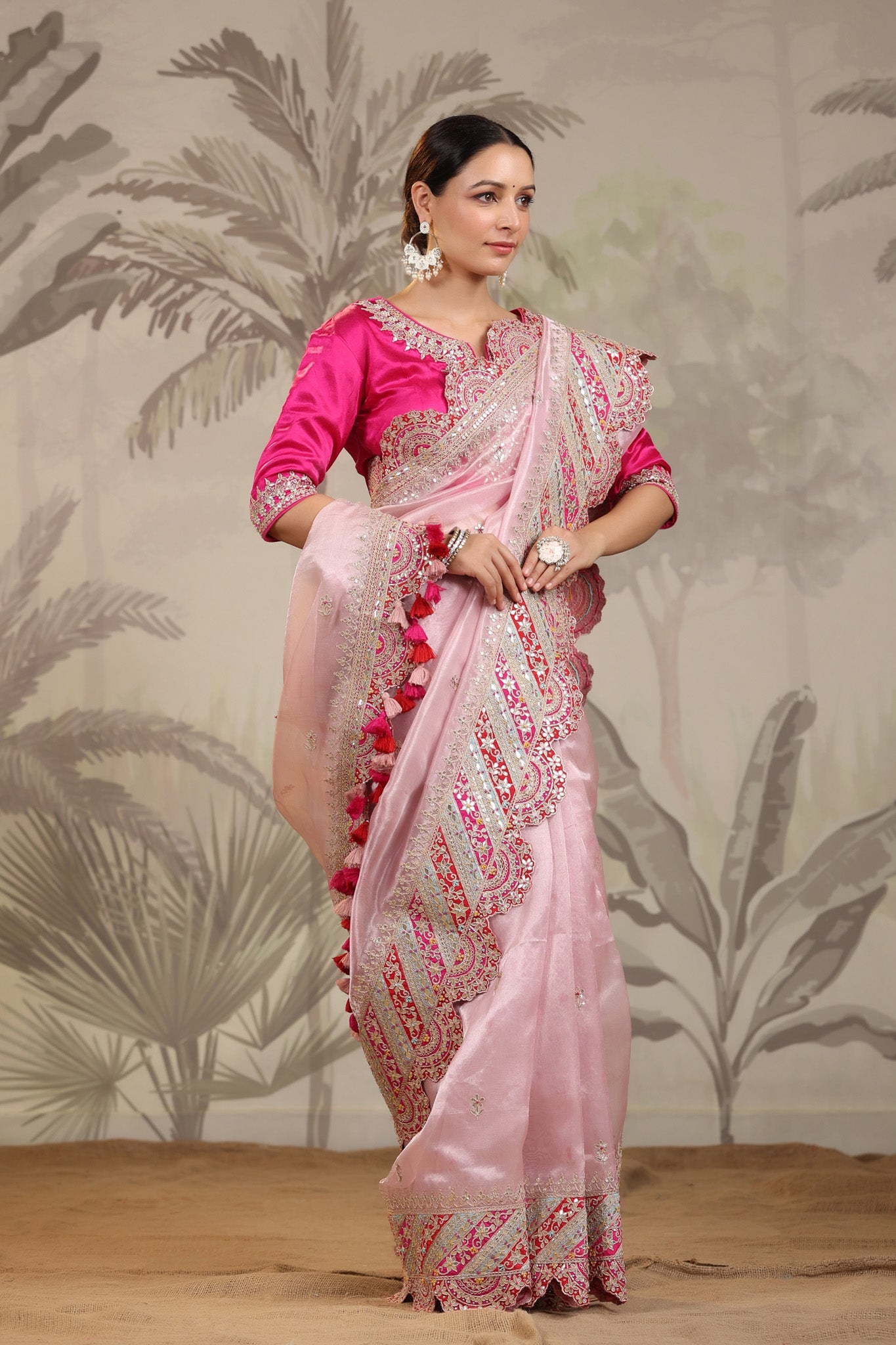 Shop light pink heavy embroidery silk sari online in USA with pink designer blouse. Make a fashion statement on festive occasions and weddings with designer suits, Indian dresses, Anarkali suits, palazzo suits, designer sarees, sharara suits, Bollywood saris from Pure Elegance Indian fashion store in USA.-side