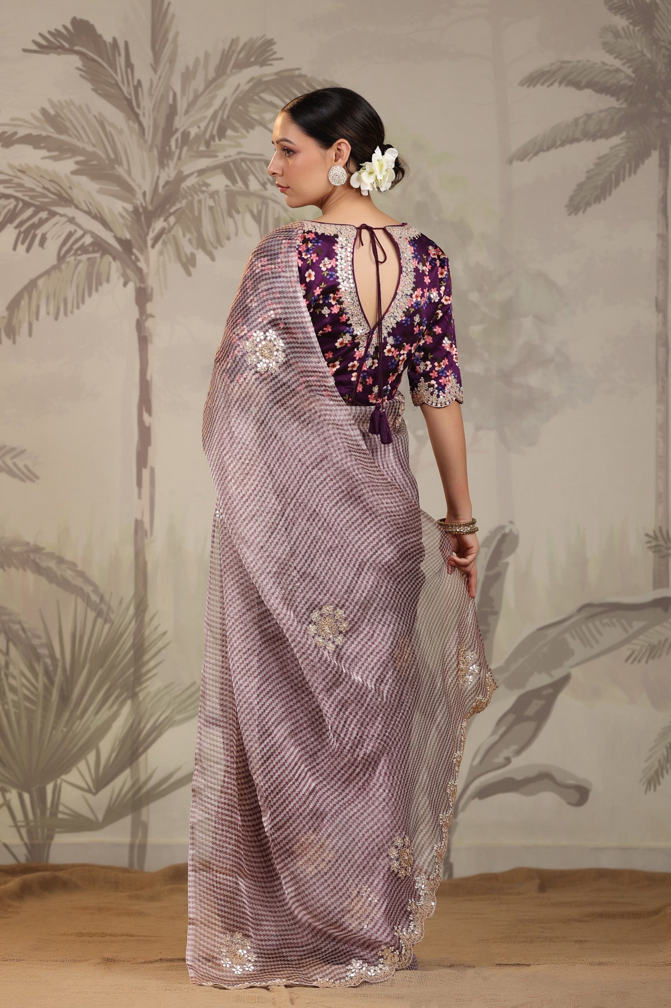 Buy purple embroidered organza silk sari online in USA with designer blouse. Make a fashion statement on festive occasions and weddings with designer suits, Indian dresses, Anarkali suits, palazzo suits, designer sarees, sharara suits, Bollywood saris from Pure Elegance Indian fashion store in USA.-back