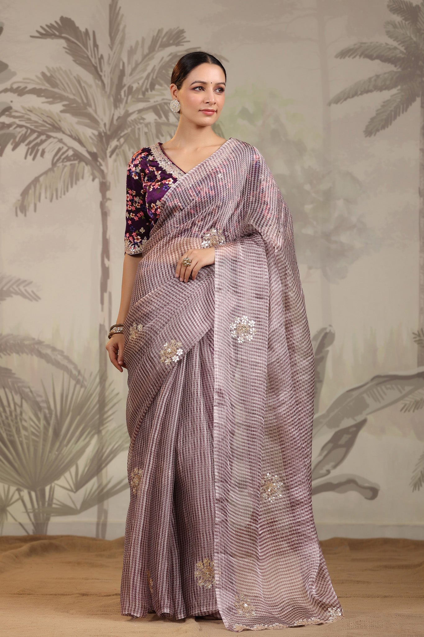 Buy purple embroidered organza silk sari online in USA with designer blouse. Make a fashion statement on festive occasions and weddings with designer suits, Indian dresses, Anarkali suits, palazzo suits, designer sarees, sharara suits, Bollywood saris from Pure Elegance Indian fashion store in USA.-full view