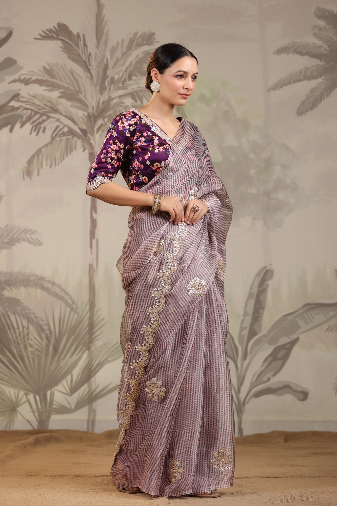 Buy purple embroidered organza silk sari online in USA with designer blouse. Make a fashion statement on festive occasions and weddings with designer suits, Indian dresses, Anarkali suits, palazzo suits, designer sarees, sharara suits, Bollywood saris from Pure Elegance Indian fashion store in USA.-side