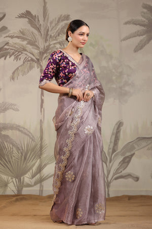 Buy purple embroidered organza silk sari online in USA with designer blouse. Make a fashion statement on festive occasions and weddings with designer suits, Indian dresses, Anarkali suits, palazzo suits, designer sarees, sharara suits, Bollywood saris from Pure Elegance Indian fashion store in USA.-side