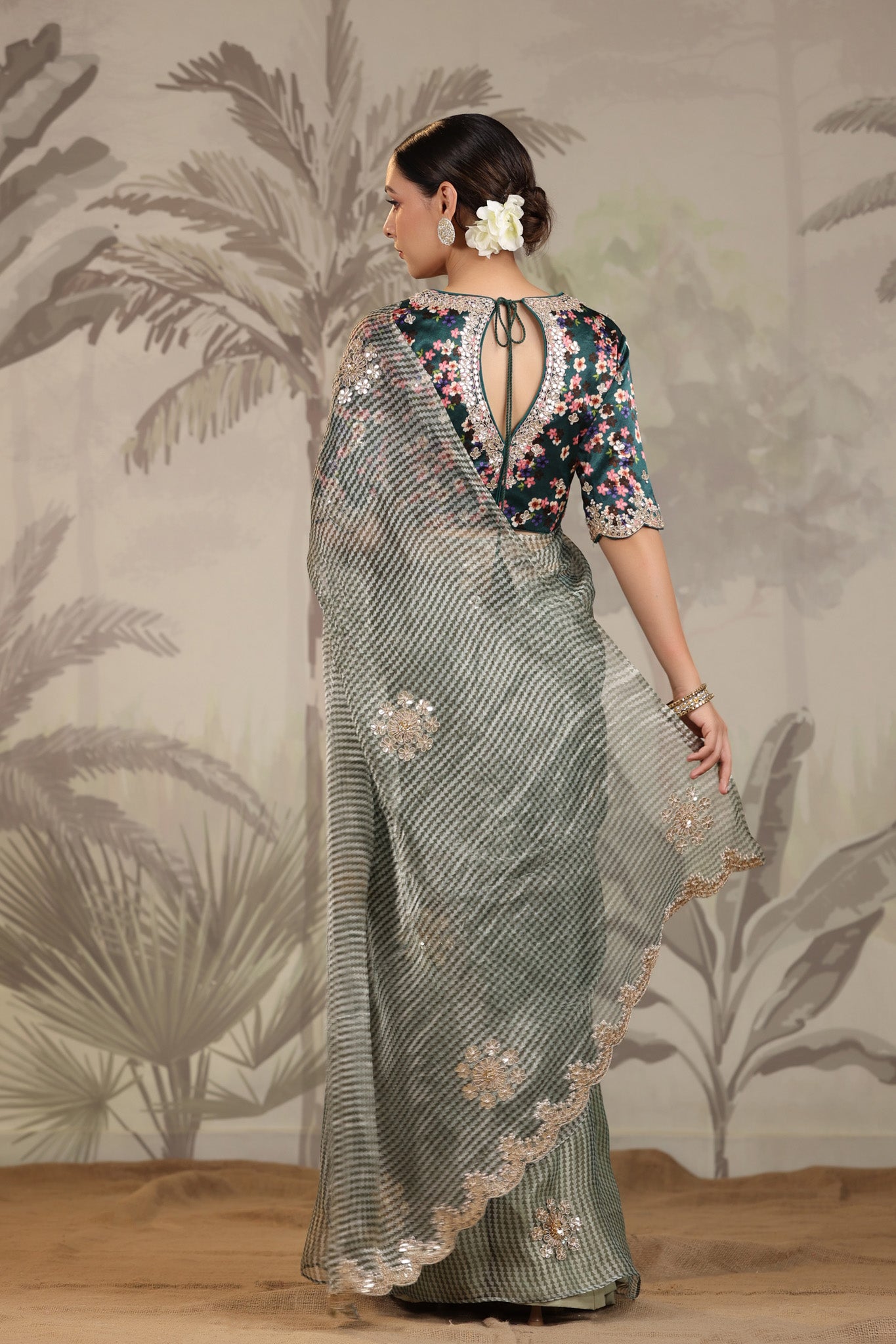 Shop beautiful light grey embroidered organza silk sari online in USA with designer blouse. Make a fashion statement on festive occasions and weddings with designer suits, Indian dresses, Anarkali suits, palazzo suits, designer sarees, sharara suits, Bollywood saris from Pure Elegance Indian fashion store in USA.-back