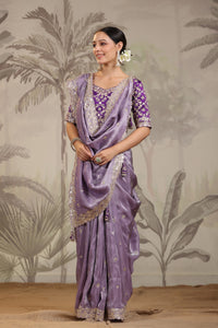 Shop lavender embroidered silk saree online in USA with embroidered designer blouse. Make a fashion statement on festive occasions and weddings with designer suits, Indian dresses, Anarkali suits, palazzo suits, designer sarees, sharara suits, Bollywood saris from Pure Elegance Indian fashion store in USA.-full view