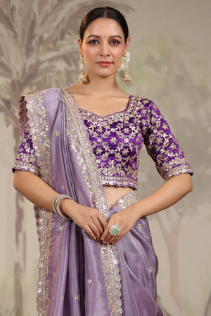 Shop lavender embroidered silk saree online in USA with embroidered designer blouse. Make a fashion statement on festive occasions and weddings with designer suits, Indian dresses, Anarkali suits, palazzo suits, designer sarees, sharara suits, Bollywood saris from Pure Elegance Indian fashion store in USA.-closeup