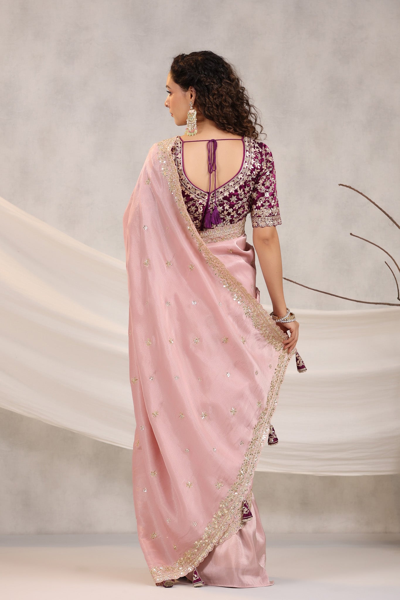 Shop powder pink embroidered silk saree online in USA with embroidered designer blouse. Make a fashion statement on festive occasions and weddings with designer suits, Indian dresses, Anarkali suits, palazzo suits, designer sarees, sharara suits, Bollywood saris from Pure Elegance Indian fashion store in USA.-back