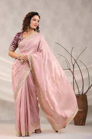 Shop powder pink embroidered silk saree online in USA with embroidered designer blouse. Make a fashion statement on festive occasions and weddings with designer suits, Indian dresses, Anarkali suits, palazzo suits, designer sarees, sharara suits, Bollywood saris from Pure Elegance Indian fashion store in USA.-pallu
