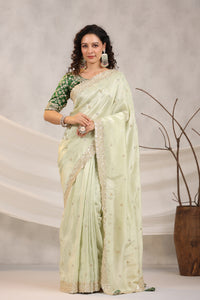Shop beautiful pista green embroidered silk saree online in USA with embroidered designer blouse. Make a fashion statement on festive occasions and weddings with designer suits, Indian dresses, Anarkali suits, palazzo suits, designer sarees, sharara suits, Bollywood saris from Pure Elegance Indian fashion store in USA.-full view