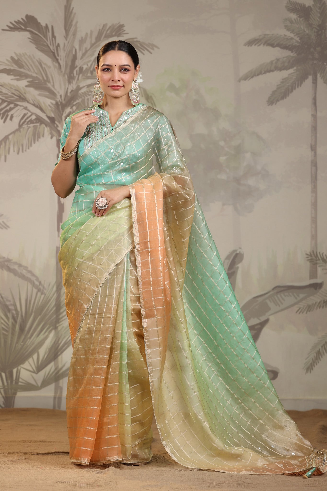 Buy peach and green embroidered tissue silk saree online in USA with embroidered blouse. Make a fashion statement on festive occasions and weddings with designer suits, Indian dresses, Anarkali suits, palazzo suits, designer sarees, sharara suits, Bollywood saris from Pure Elegance Indian fashion store in USA.-front