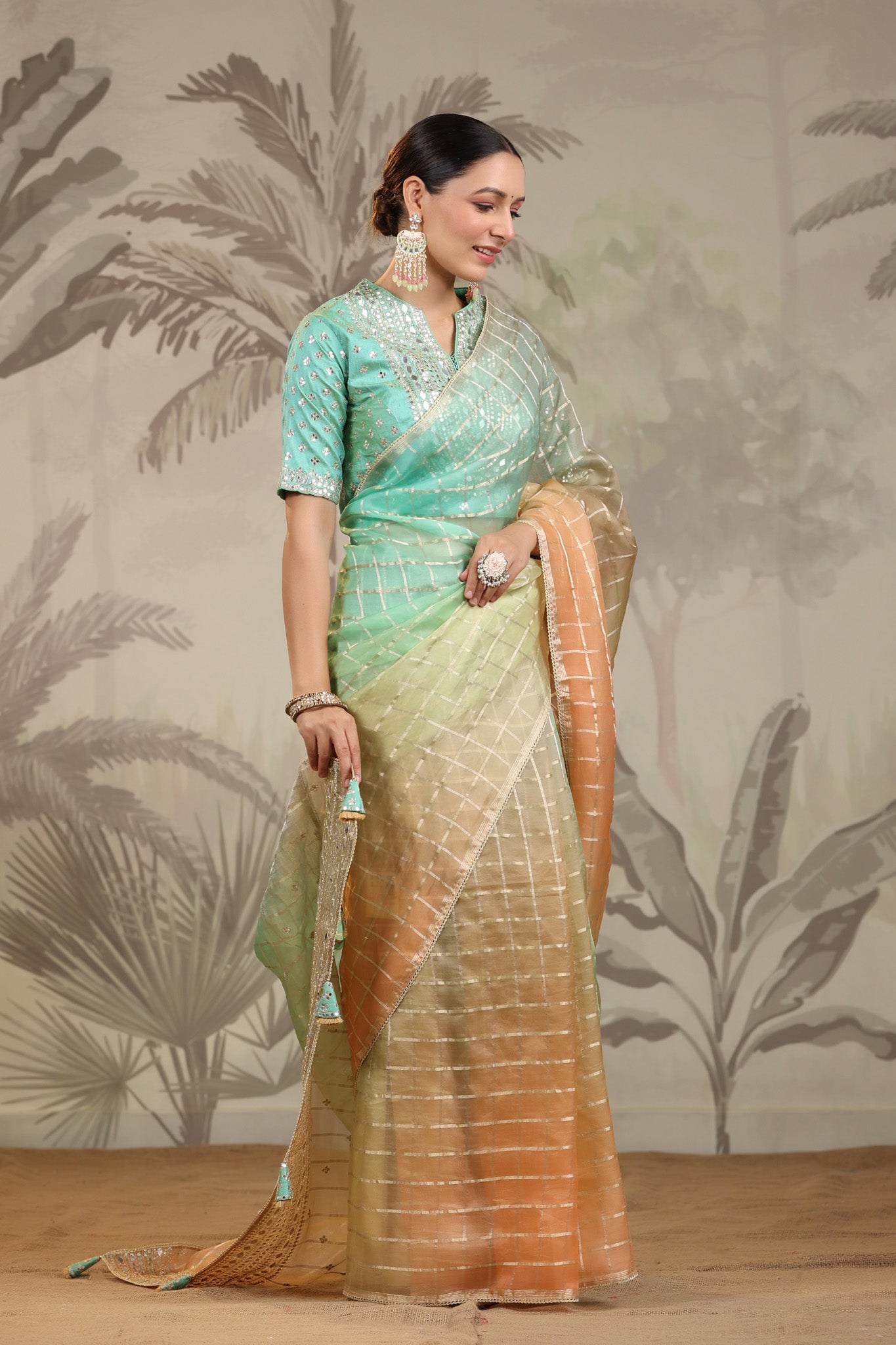 Buy peach and green embroidered tissue silk saree online in USA with embroidered blouse. Make a fashion statement on festive occasions and weddings with designer suits, Indian dresses, Anarkali suits, palazzo suits, designer sarees, sharara suits, Bollywood saris from Pure Elegance Indian fashion store in USA.-side
